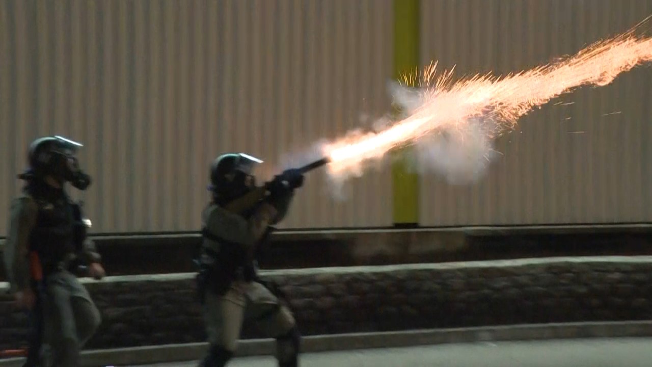 Police use tear gas to disperse crowd marking three months since Yuen Long MTR station attack