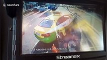 Bus deliberately crashes into taxi which blocks its way after driver was encouraged by passengers