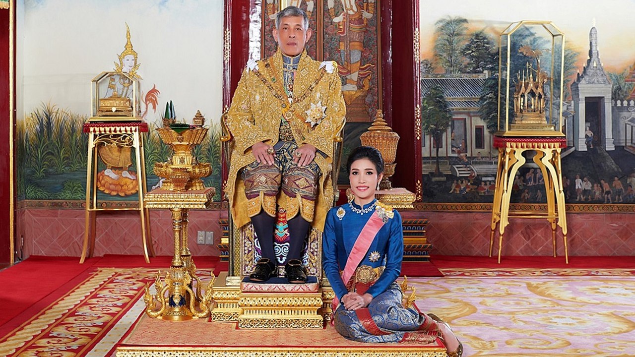 Thailand’s king strips royal consort of titles and military ranks for disloyalty