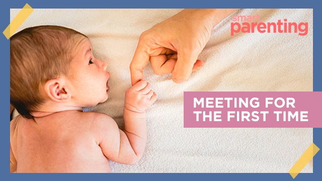 7 Photos of Dads Meeting Their Babies for the First Time