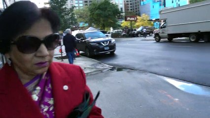 BDMV-3 Aruna & Hari Sharma walking at EHarrison St to S Michigan St for Bus 3 to McCormick Place Oct 21, 2019