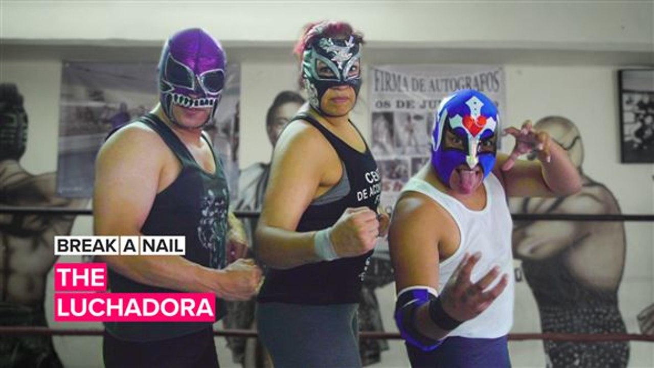 Break A Nail: This female luchadora isn't pulling any punches