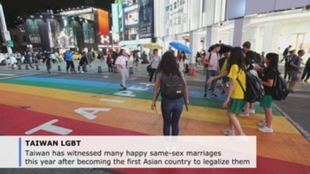 Taiwan's new gay marriages forge new path in Asia