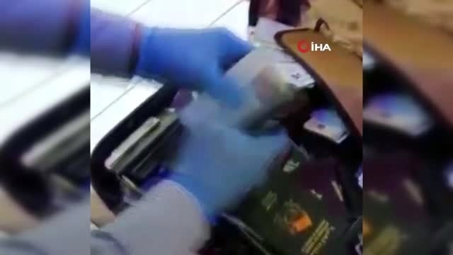 Sahte para operasyonunda ele geçirilenler emniyet müdürlüğünde sergilendi...Operasyon anı kamerada