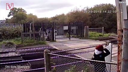 Shocking Video Shows Train Narrowly Missing Biker