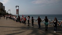 'One heart from north to south': Protesters form human chain across Lebanon