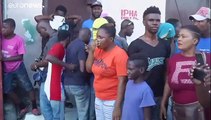 شاهد: قتيلان في تظاهرات في هايتي لمئات من عناصر الشرطة