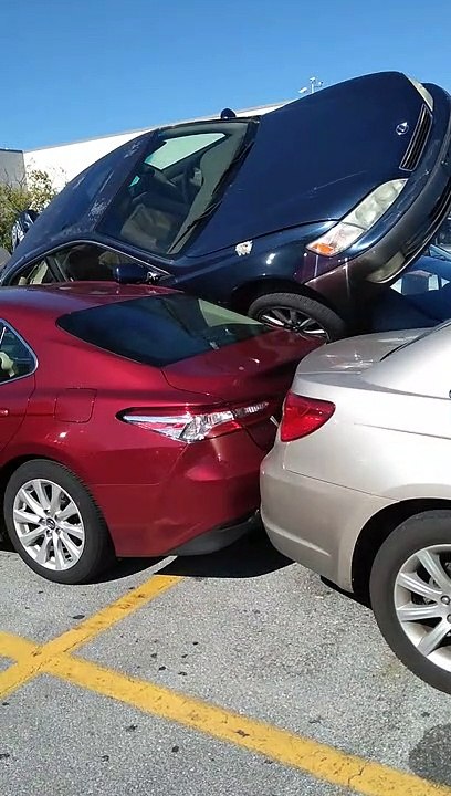 Busy Carpark Has Cars Stacked Two High