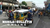 Workers  in Agdao, Davao City rush to the streets as a strong tremor jolts the city
