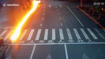Car leaves trail of flames on Chinese highway after drunk driver crashes into central reservation
