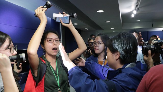 Journalist protests at Hong Kong police press conference over force’s treatment of colleagues