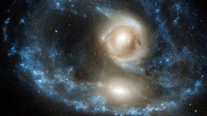 Hubble Spots 'Ghostly Face' In 'Titanic' Collision Of Two Massive Galaxies