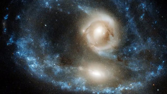 Hubble Spots 'Ghostly Face' In 'Titanic' Collision Of Two Massive Galaxies