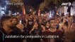 Lebanese protesters celebrate following PM resignation