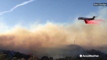 Planes drop retardant on Easy Fire