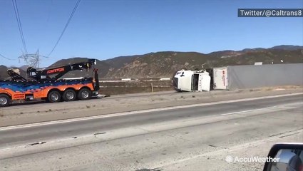 Tipped tractor-trailers finally moved out of the way