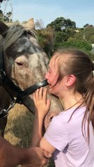 Girl Sheds Tears of Joy over Her Horse