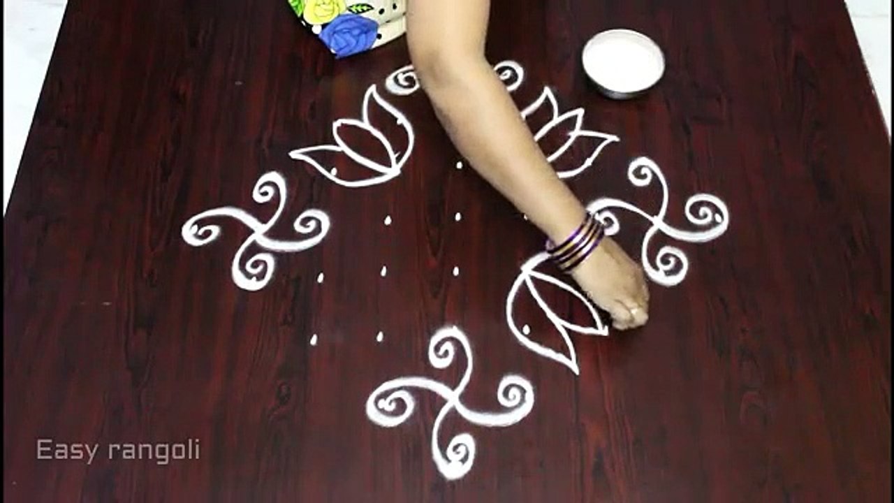 beginners lotus flower kolam with 9x1 dots    chukkala muggulu designs    easy rangoli designs