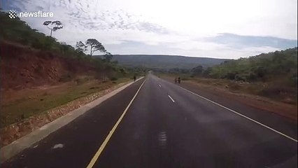 Travelling couple record roads in Zambia crumbling to mud in chaotic weather