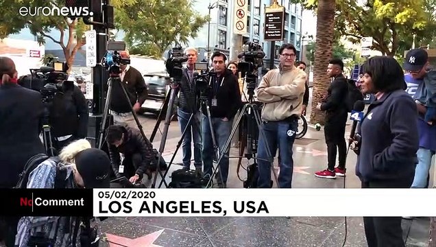 Flowers and wreaths laid on the Hollywood walk of fame star of Kirk Douglas