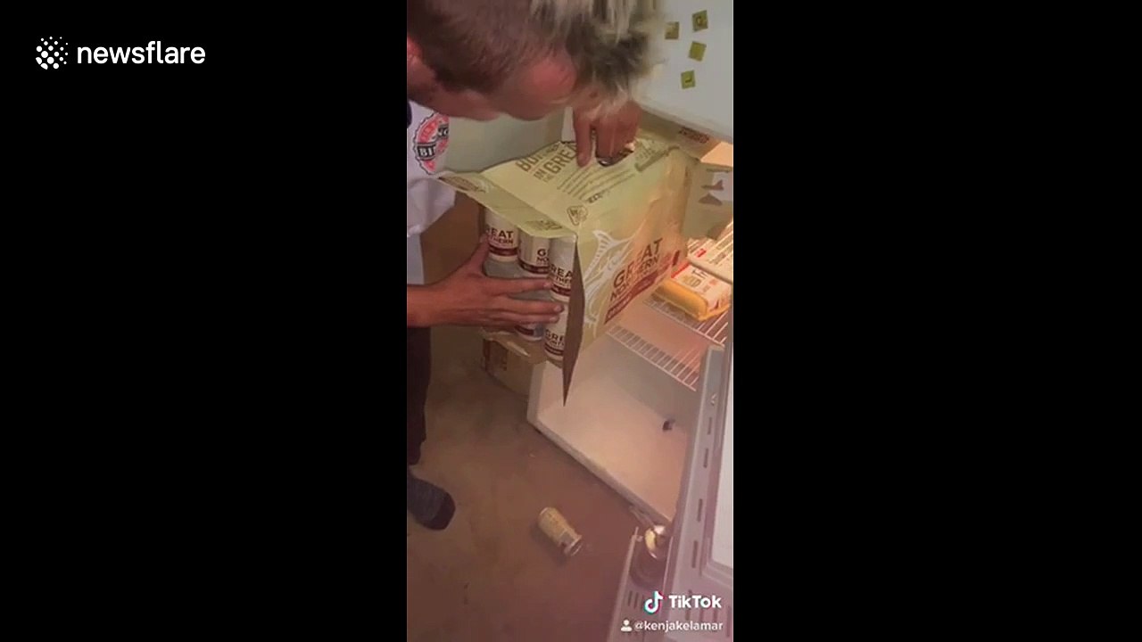Man in Australia fails when he tries to put his drinks in the refrigerator all at once