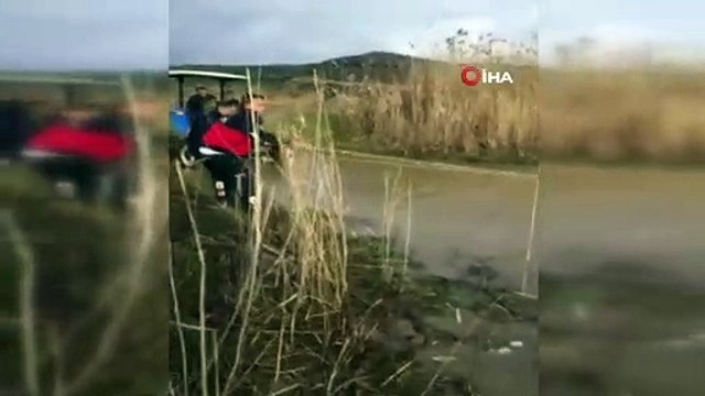 Çayda traktörle mahsur kalan iki kişi halat yardımıyla kurtarıldı