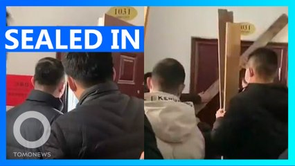 China is sealing people in their homes amid virus outbreak