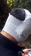 someone wearing diaper on his face