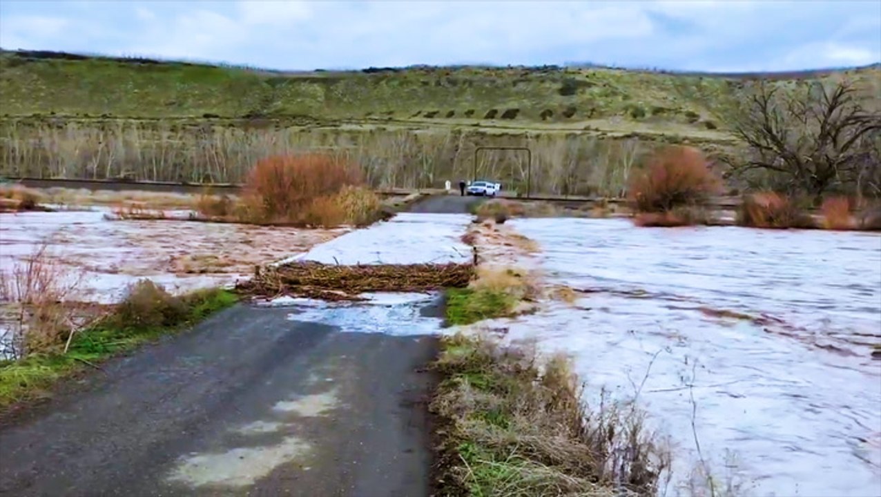 River rages as residents evacuate
