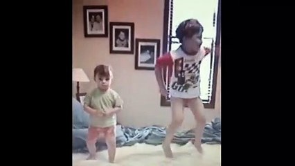 Little boys Jump On Bed And One Falls Off