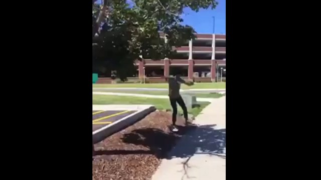 Skateboarder Ollies Over A Bump And Falls