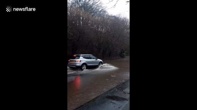 River bursts banks in Rossendale flooding roads as Storm Ciara batters UK