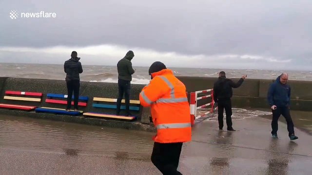 UK storm-watcher swept off feet by huge wave on the Wirrall