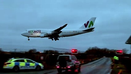 Evacuated Brits land in UK from China