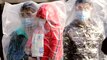 China coronavirus toll surges past 800, exceeds SARS