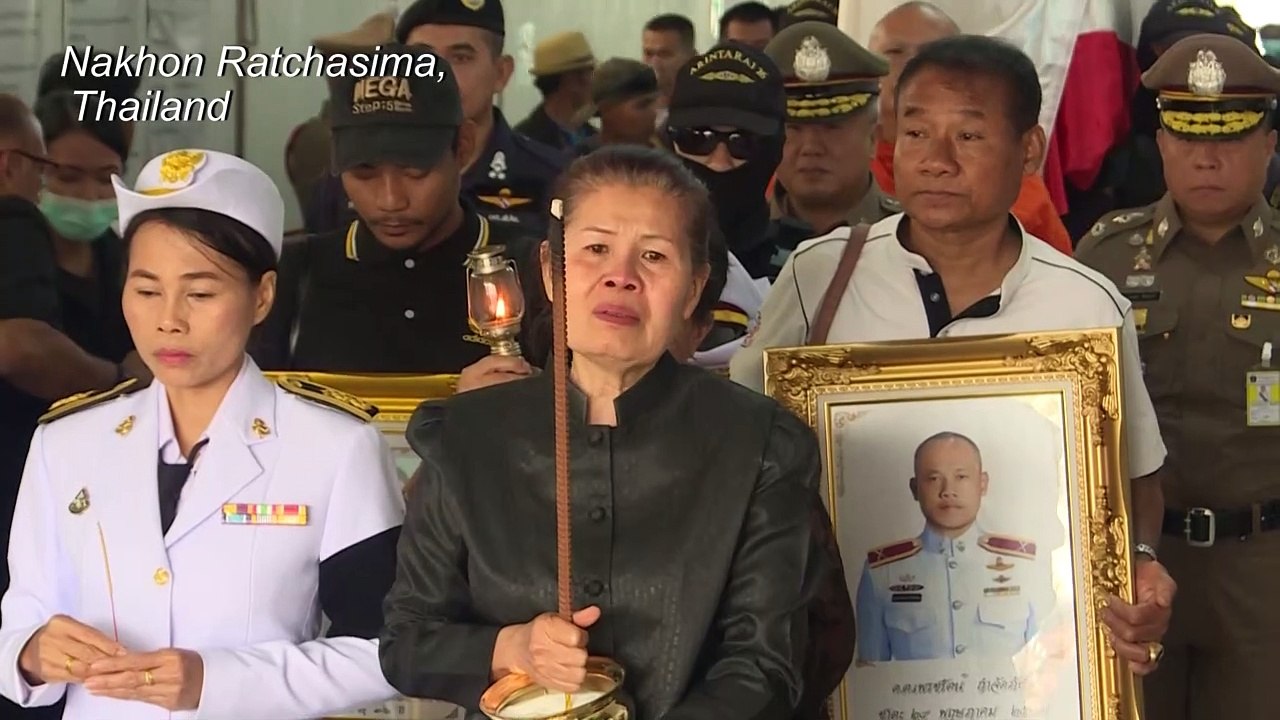Families claim their dead as Thais mourn 29 killed in mass shooting