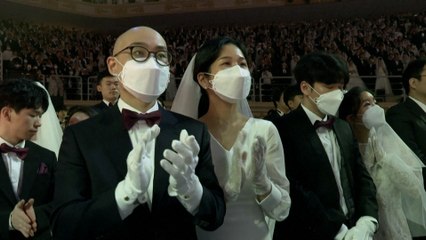 In sickness and health: 6,000 couples wed at church event in South Korea despite coronavirus outbre