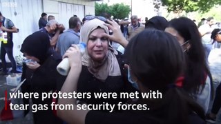 Iraq protesters defy curfew - BBC News