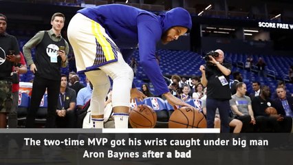 Download Video: Warriors star Curry breaks hand