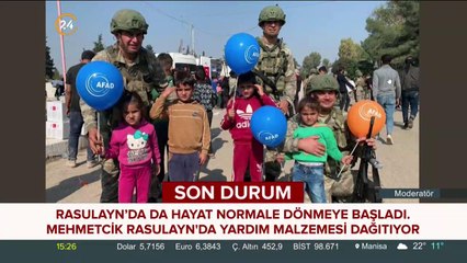 Mehmetçik Resulayn'da yardım malzemesi dağıtıyor