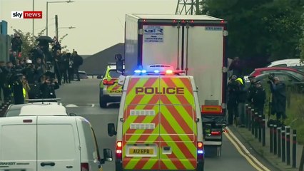 Police try to identify 39 bodies found in container