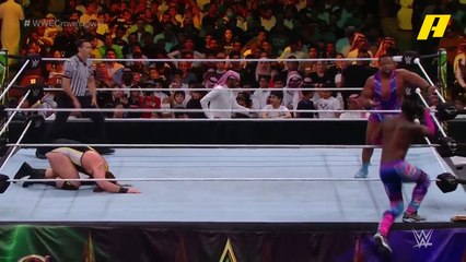 فريق ذا نيو داي يقصي فريق هيفي ماشيناري من المنافسة بحركة فنية