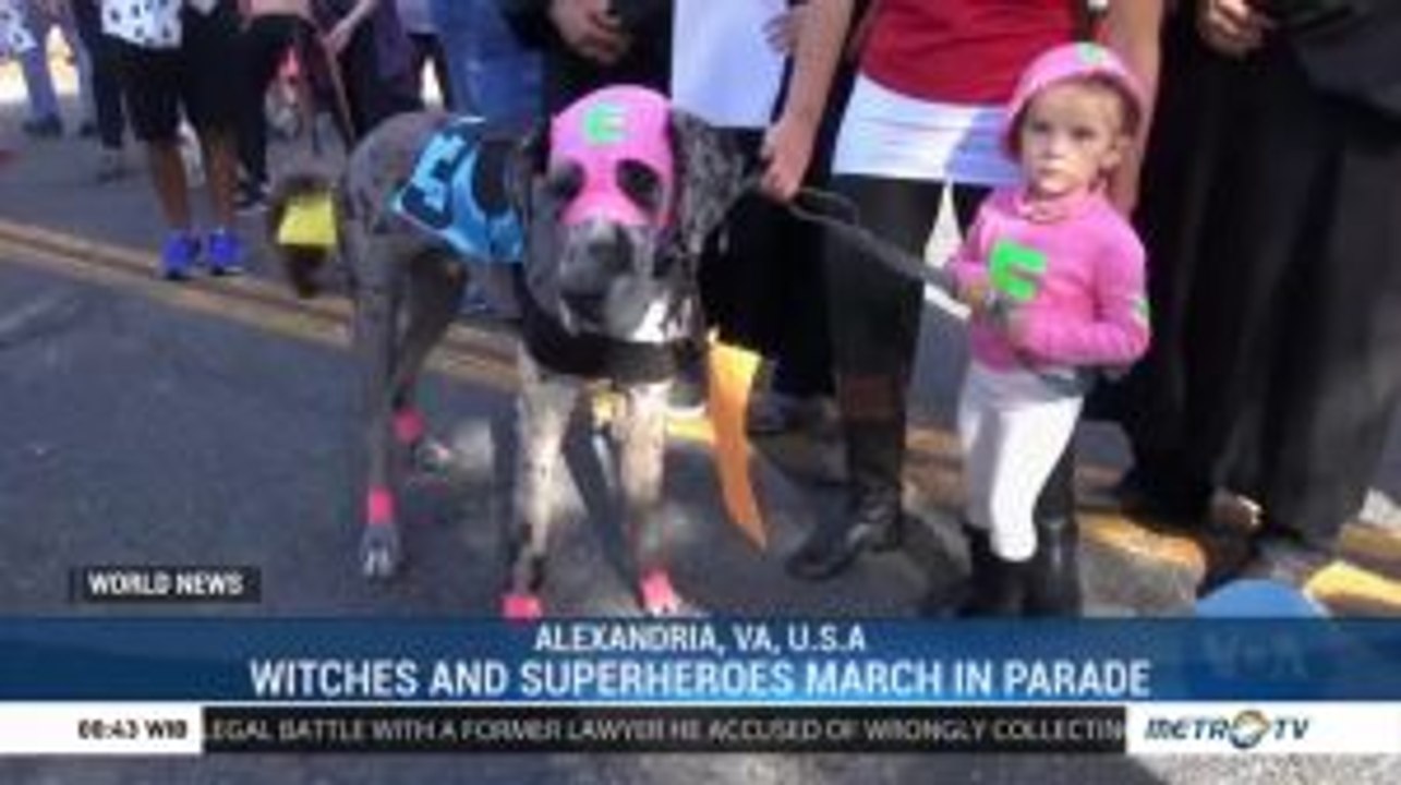 Witches and Superheroes March in Parade