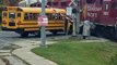 School Bus Comes Uncomfortably Close to Train