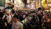 Tear gas fired as Hong Kong protesters gather in downtown Hong Kong on Halloween night