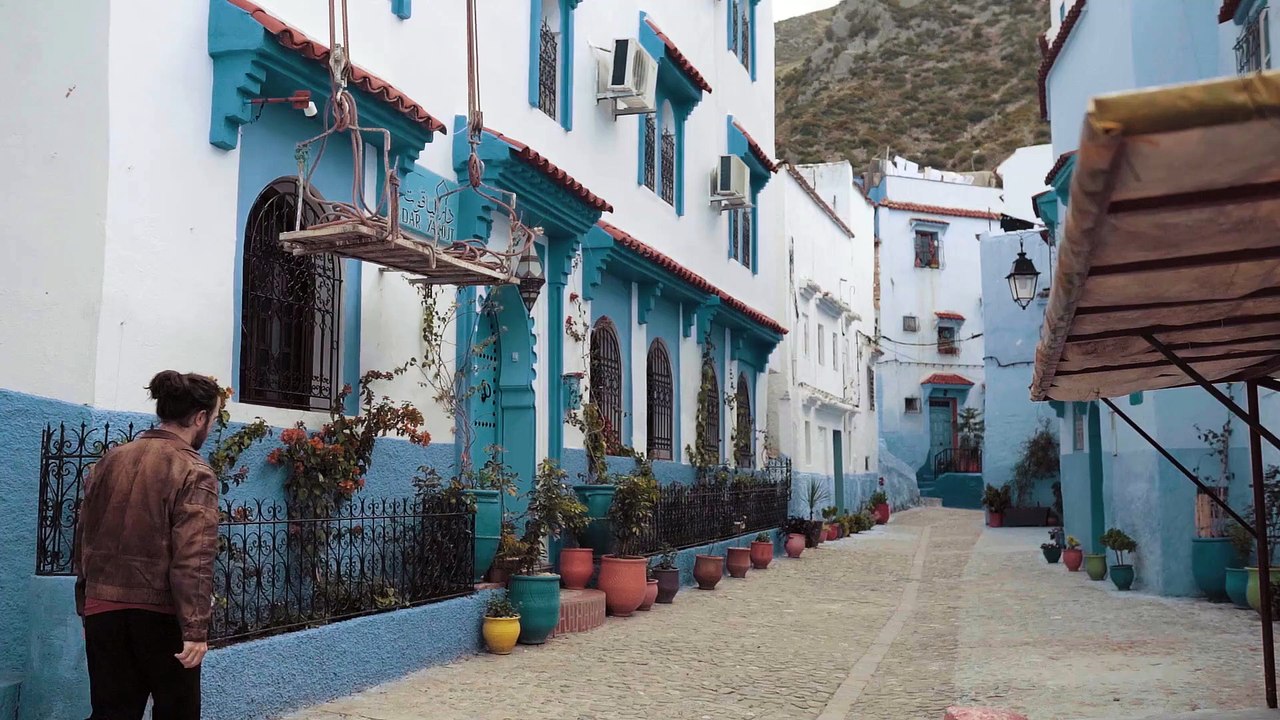 Taryn Elliott - Man Walking in Chefchaouen - Human/City (No Copyright Video 16)