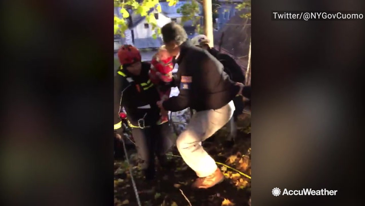 New York Governor Andrew Cuomo assists EMS crew during water rescues