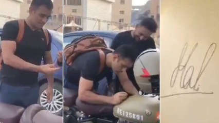 MS Dhoni Delights Fan By Signing Autograph On New Motorbike || Oneindia Telugu