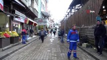 Trabzon'daki şiddetli yağışın ardından iş yerlerindeki temizlik çalışmaları sürüyor