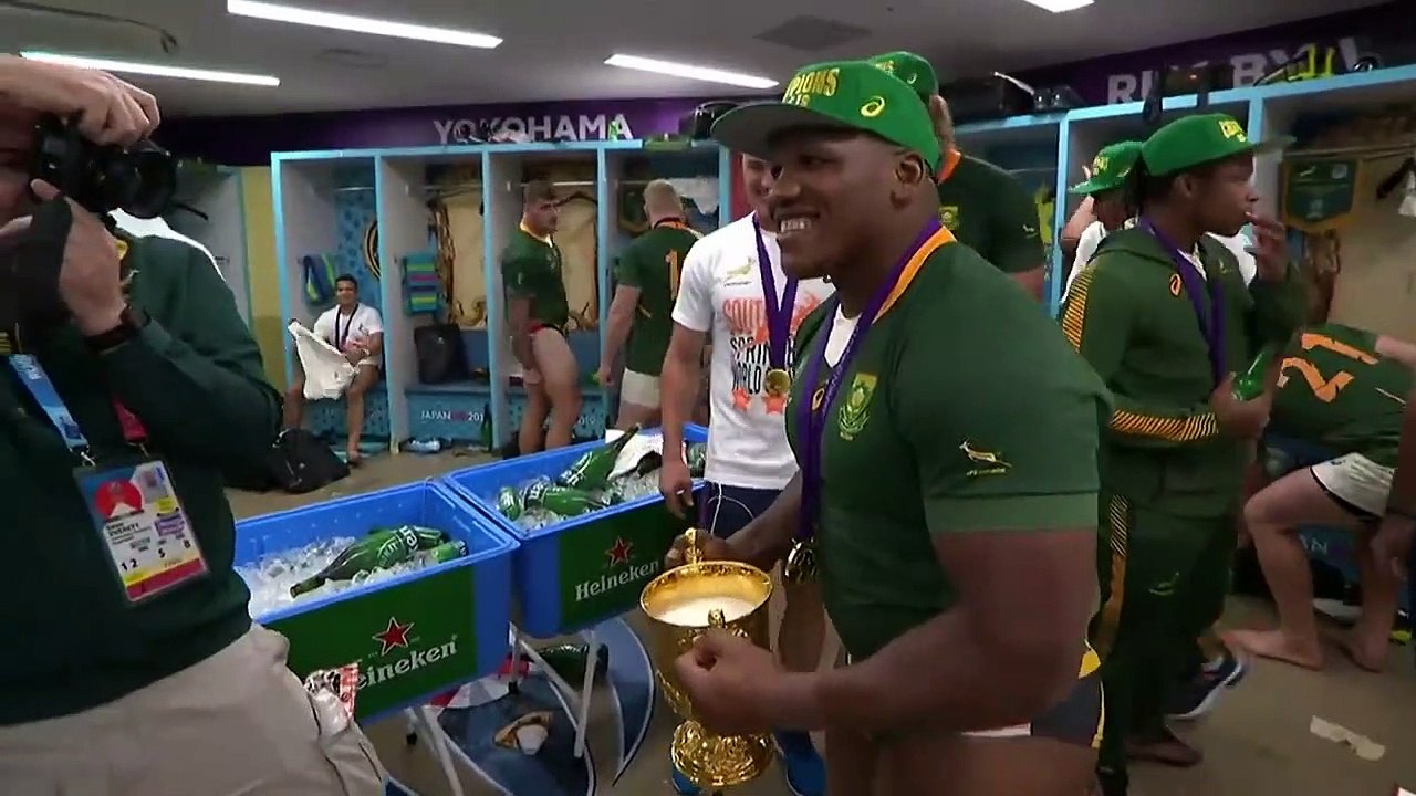 South Africa drink from Webb Ellis Cup to celebrate